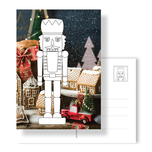 Postkarte mit Nussknacker-Ausmalmotiv auf Fotohintergrund. Rückseite mit Adressfeld und Nusskackner-Briefmarke. Eine ausgemalte Postkarte ist ein sehr persönliches und liebevolles Geschenk.