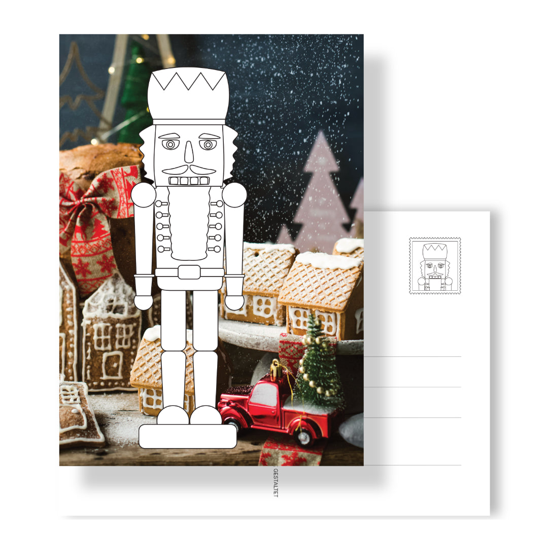 Postkarte mit Nussknacker-Ausmalmotiv auf Fotohintergrund. Rückseite mit Adressfeld und Nusskackner-Briefmarke. Eine ausgemalte Postkarte ist ein sehr persönliches und liebevolles Geschenk. 