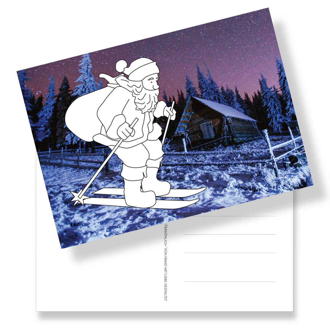 Postkarte mit einem Weihnachtsman auf Skiern zum Ausmalen auf winterlichen Fotohintergrund. Rückseite mit Adressfeld und weihnachtlcher Briefmarke. Das richtige, wenn man von Herzen verschenken möchte.