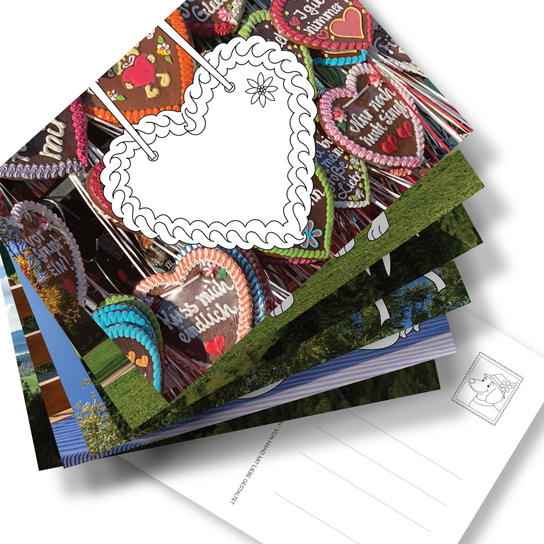 Postkarten-Set "Bayern" aus 6 Postkarten mit bayrischen Ausmalmotiven auf Fotohintergrund. Rückseite mit Adressfeld und bayrischer Briefmarke. Die kreative Art aus Bayern Grüße zu verschicken.