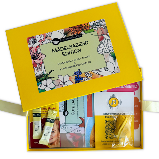 Gelbe Geschenkbox „Mädelsabend Edition“ von ErlebnisMalerei, gefüllt mit Mal- und Wellness-Extras wie Malkarten, Maske, Musik-QR-Code, Rezeptkarte, Mädelsabend-Fragen und einer kleinen Überraschungen für einen kreativen Abend.